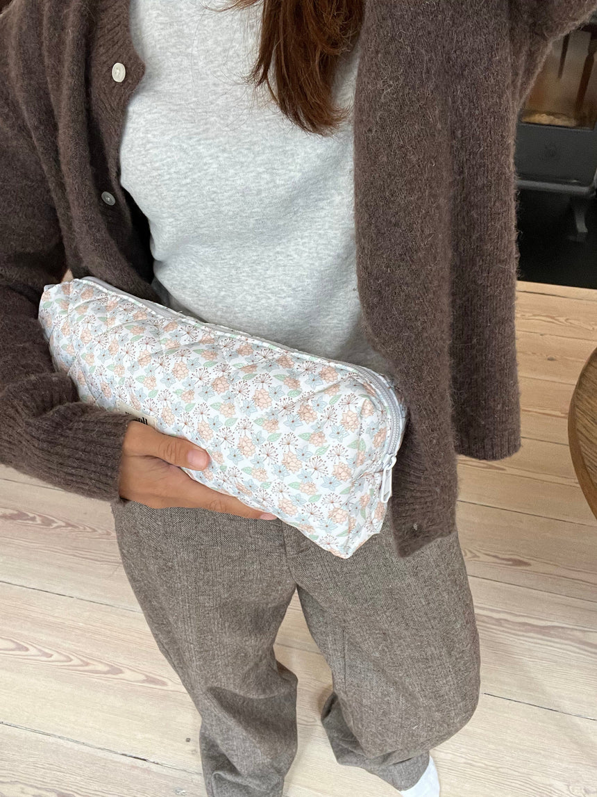 Honey Dyson sleeve - White with blue, green, and orange flowers