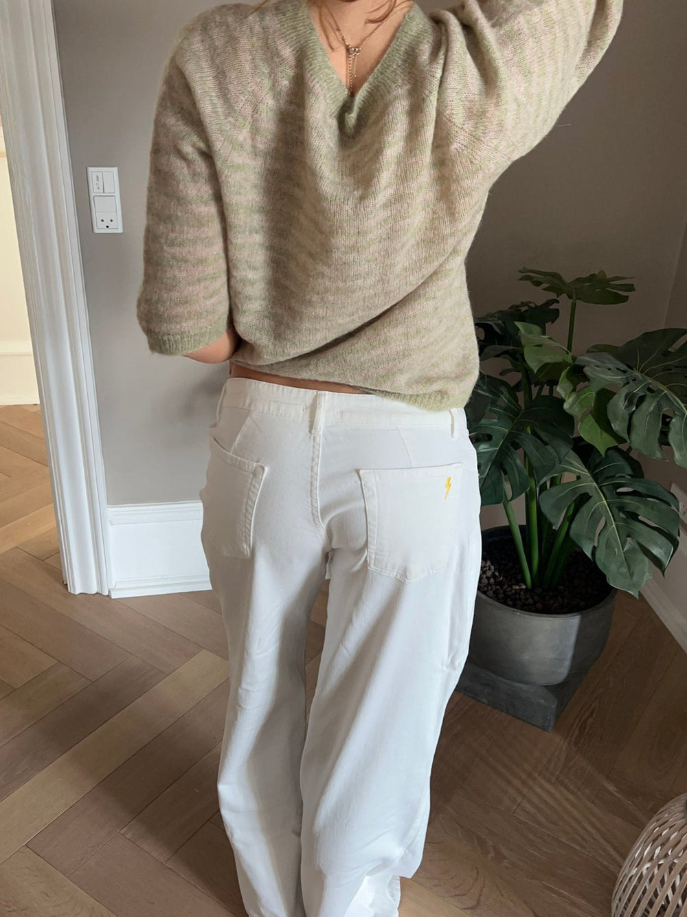 Alaia low-waisted jeans with lightning detail - White denim