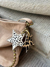 Noral star cowhide keyring – White/dark-brown/black