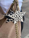 Noral star cowhide keyring – White/dark-brown/black