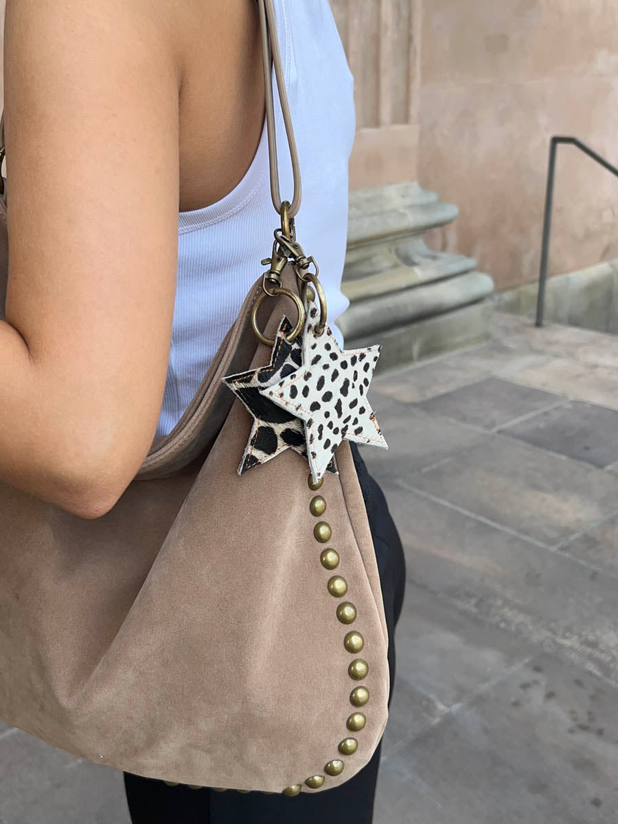 Noral star cowhide keyring – White/dark-brown/black