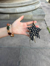 Noral dotted star cowhide keyring – Dark brown/white