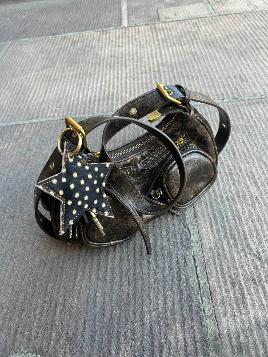 Noral dotted star cowhide keyring – Dark brown/white