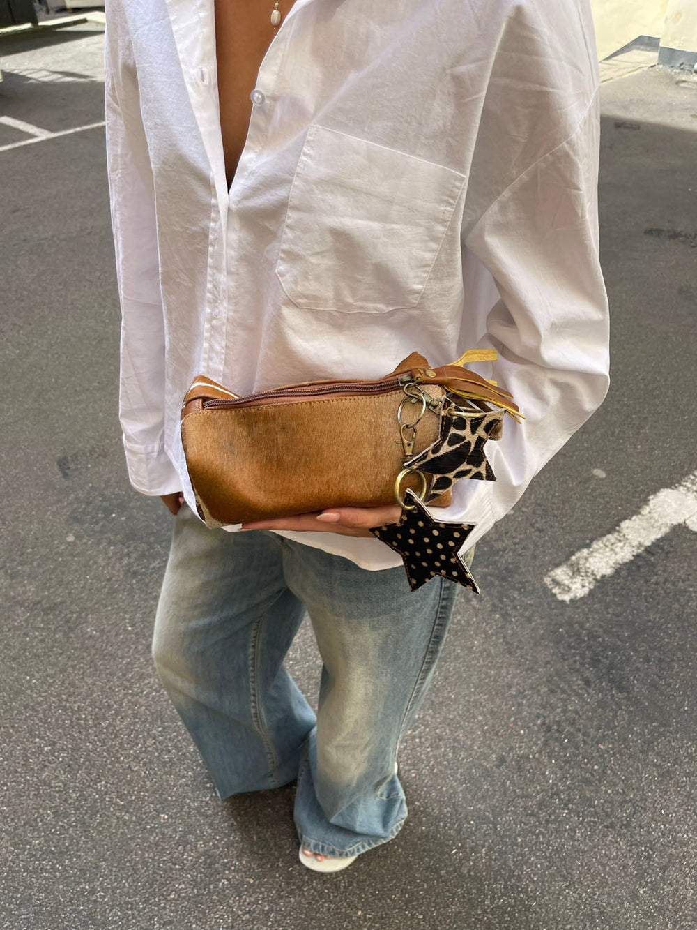 Noral dotted star cowhide keyring – Dark brown/white