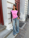 Alaia low-rise jeans with lightning detail - Light denim