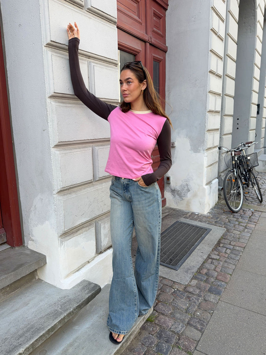 Alaia low-rise jeans with lightning detail - Light denim