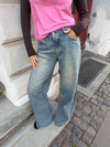 Alaia low-rise jeans with lightning detail - Light denim