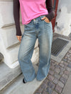 Alaia low-rise jeans with lightning detail - Light denim