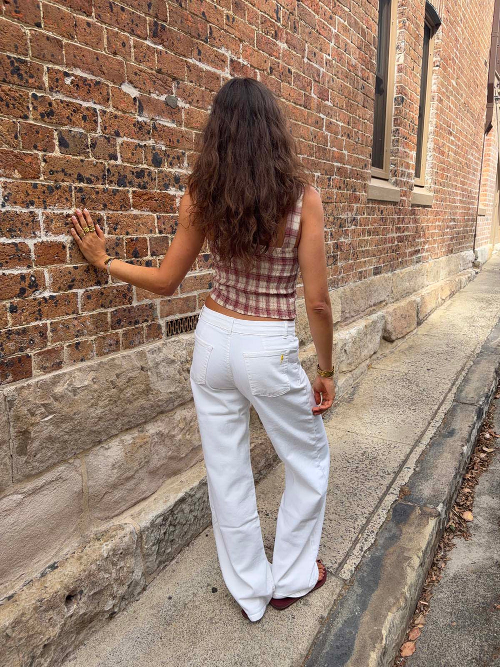 Alaia low-waisted jeans with lightning detail - White denim