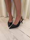 Karline slingback mules with crocodile print – Black